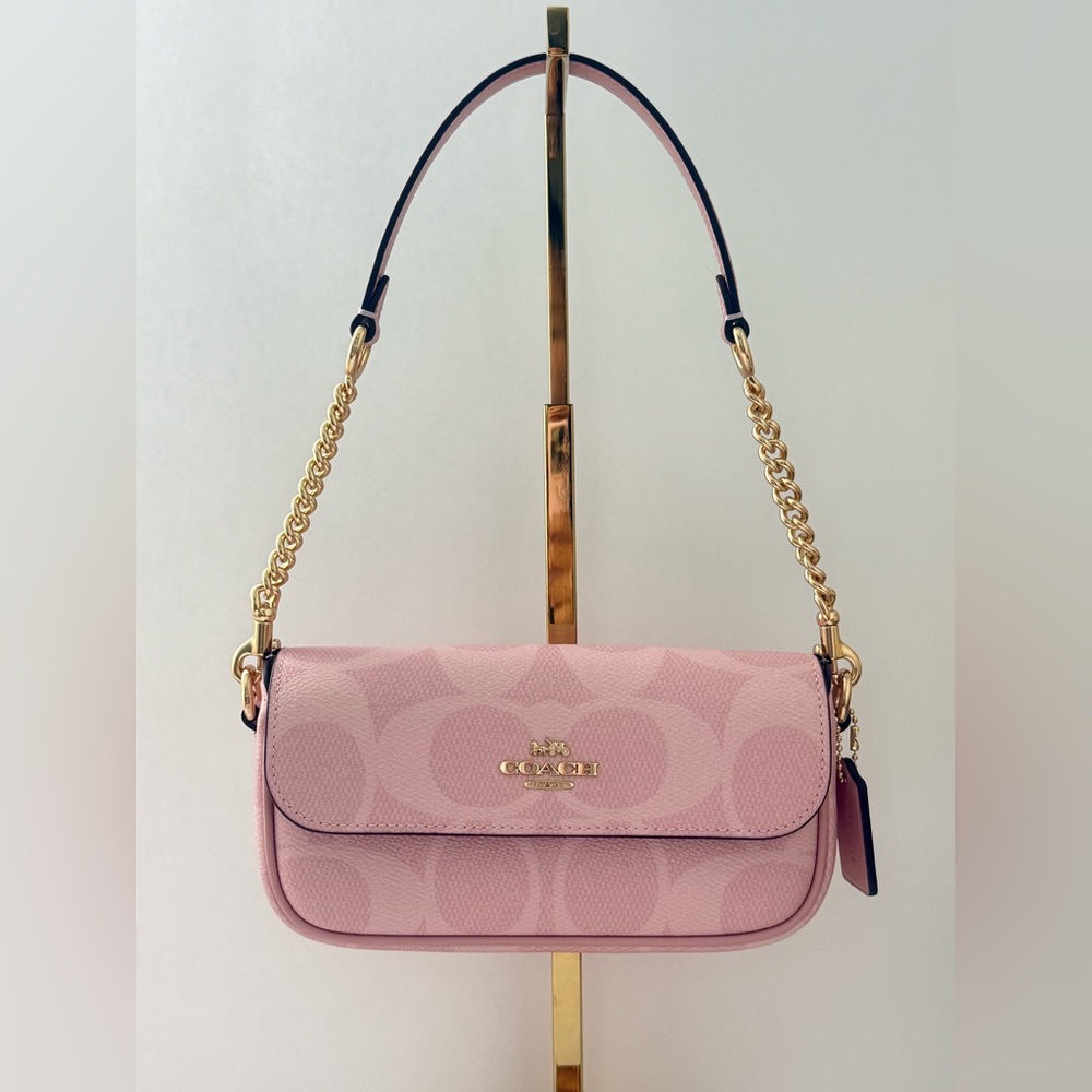 Coach Outlet Hailey Flap Bag In Signature Canvas in Gold Powder Pink.